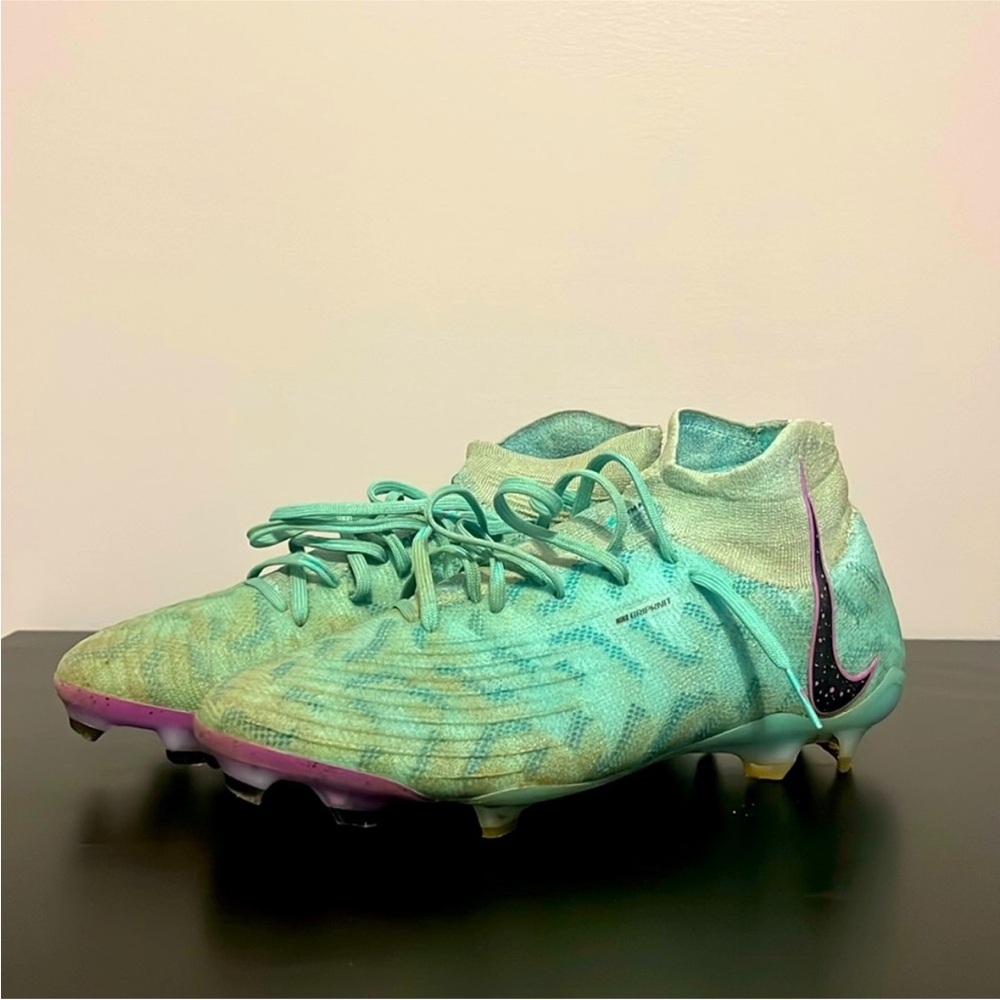 Mint Green Soccer Cleats with Purple Accents